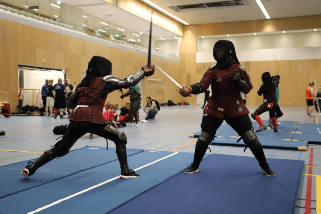 Two women fighting broadsword